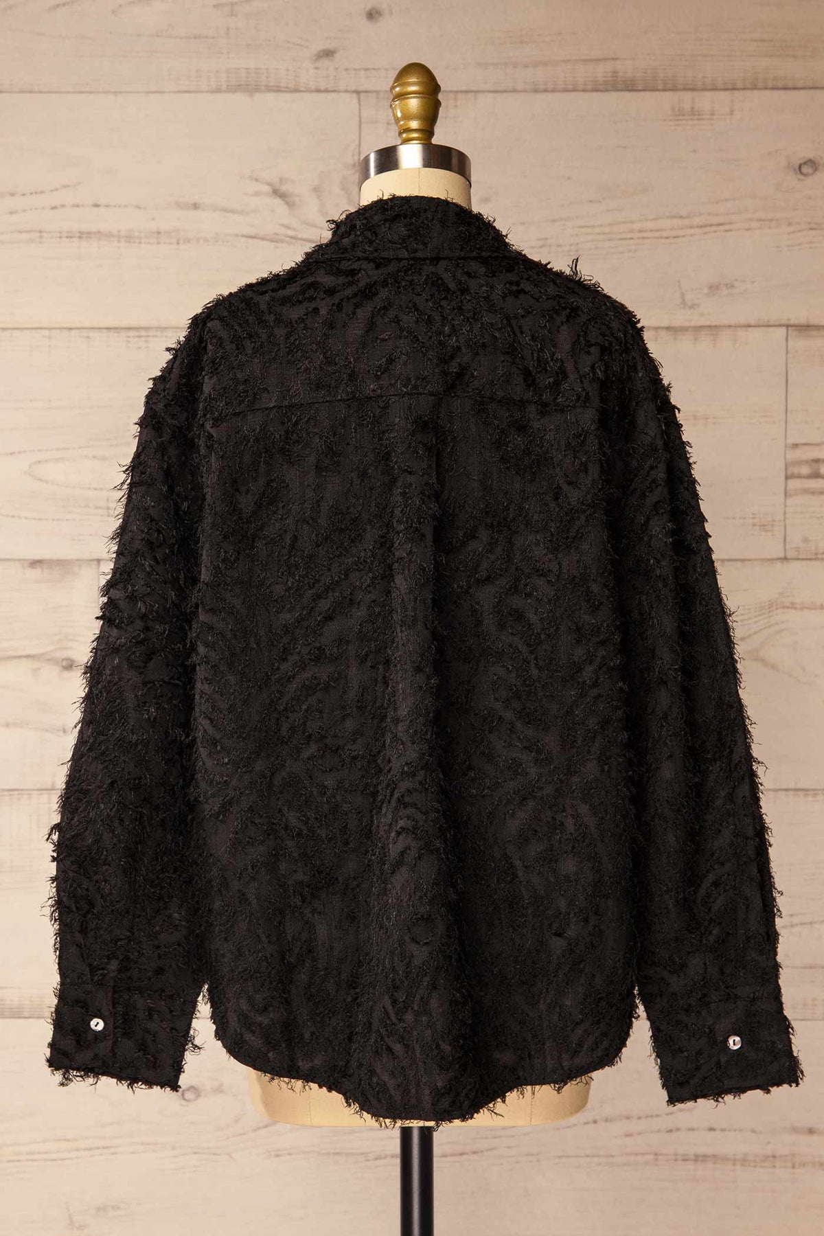back view of Ostrovnoye Black Textured Fringe Long Sleeve Button-Down Shirt at La petite garçonne