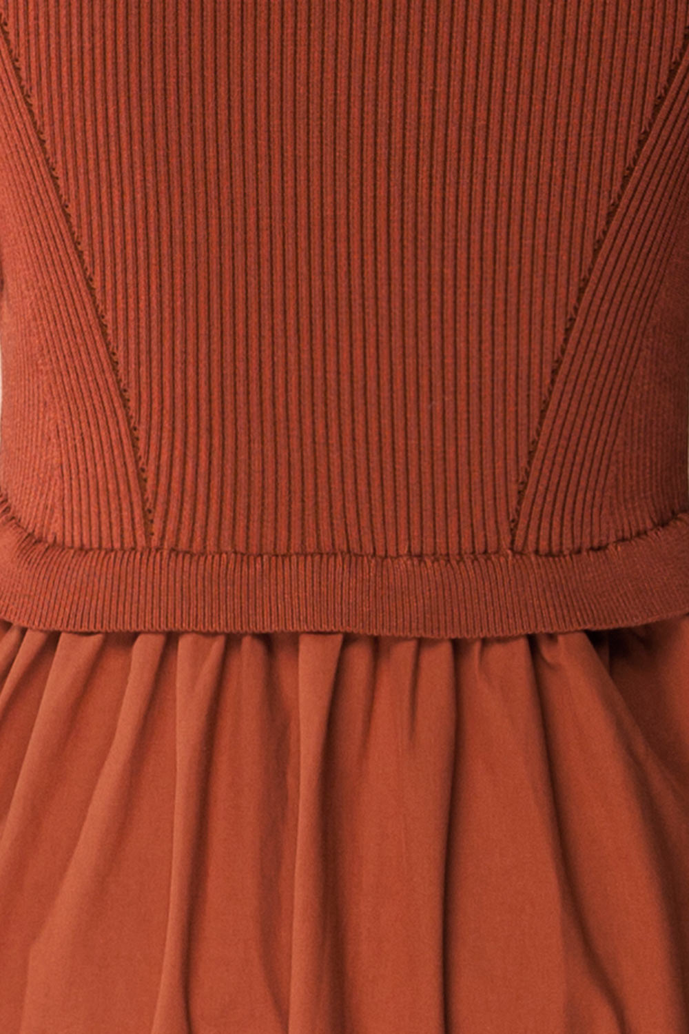 fabric of a mannequin wearing the Penrith Rust Mock Neck Midi Dress from boutique 1861