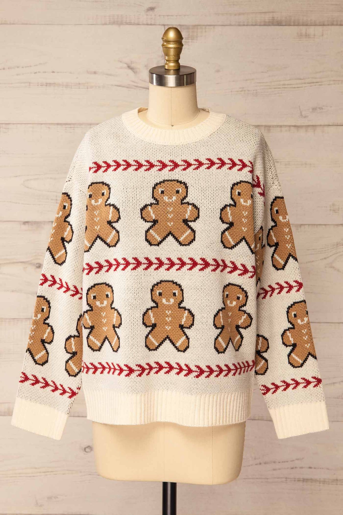 front view of Persia Ivory Gingerbread Pattern Knit Holiday Sweater at La petite garçonne