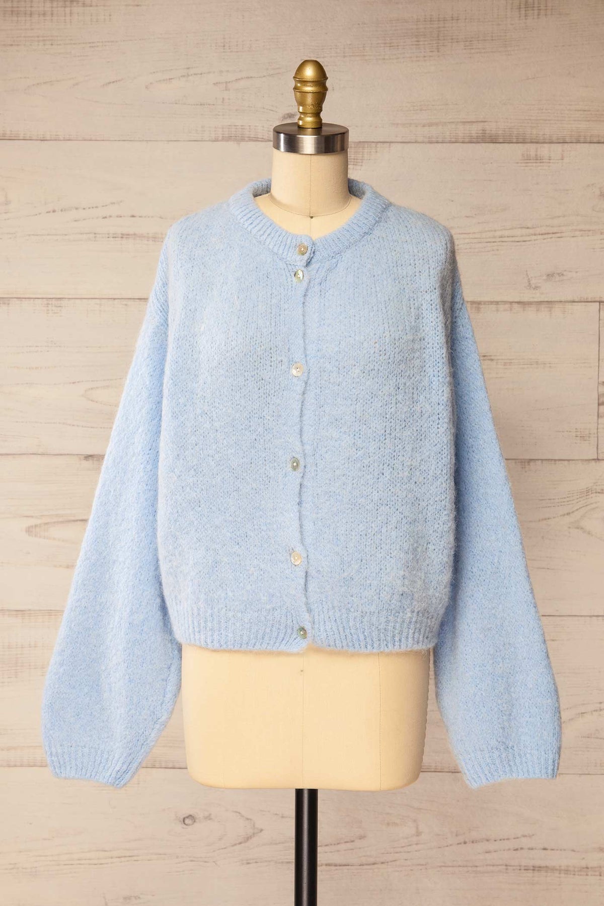 front view of Peruth Light Blue Button-Front Knit Cardigan at La petite garçonne