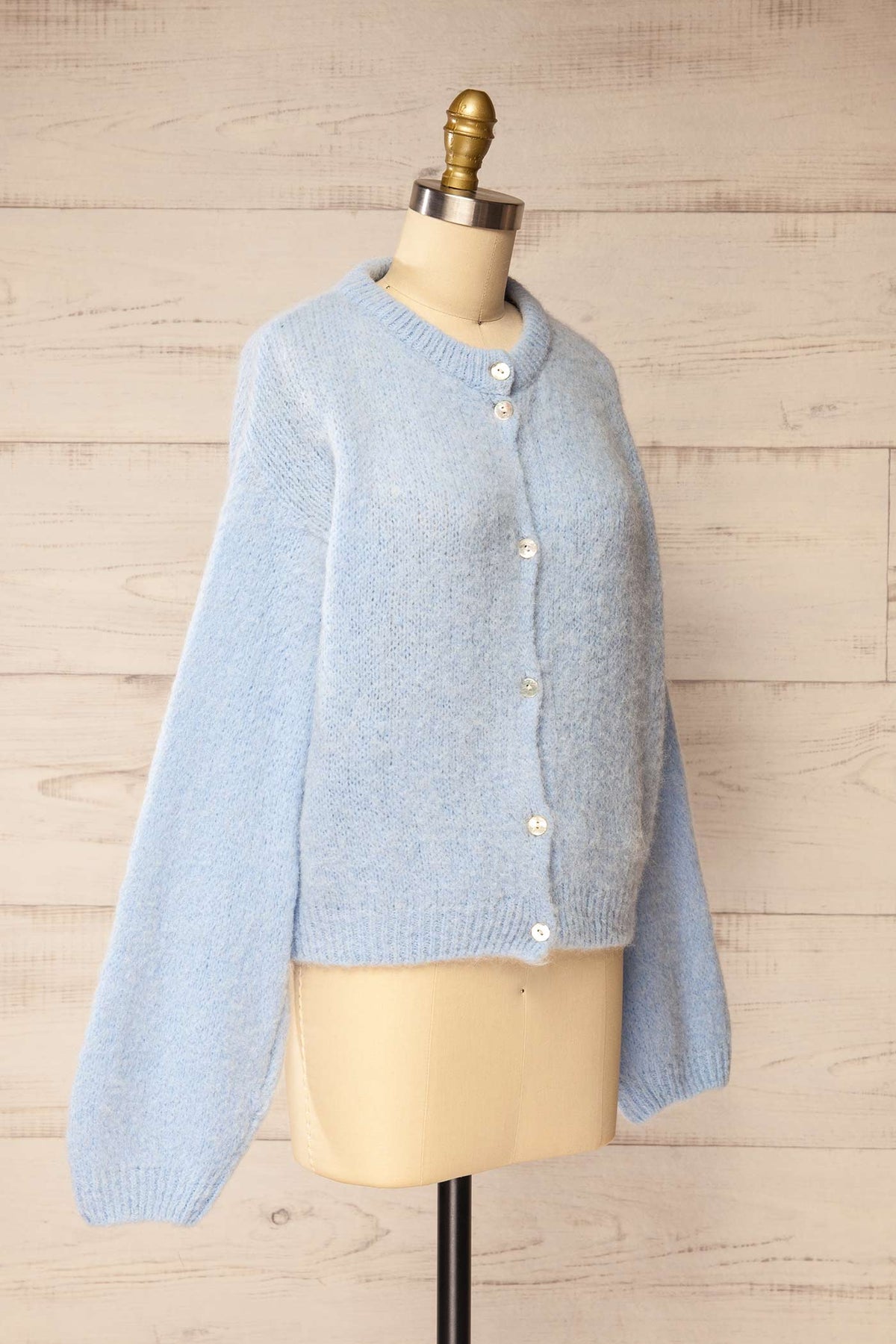 side view of Peruth Light Blue Button-Front Knit Cardigan at La petite garçonne