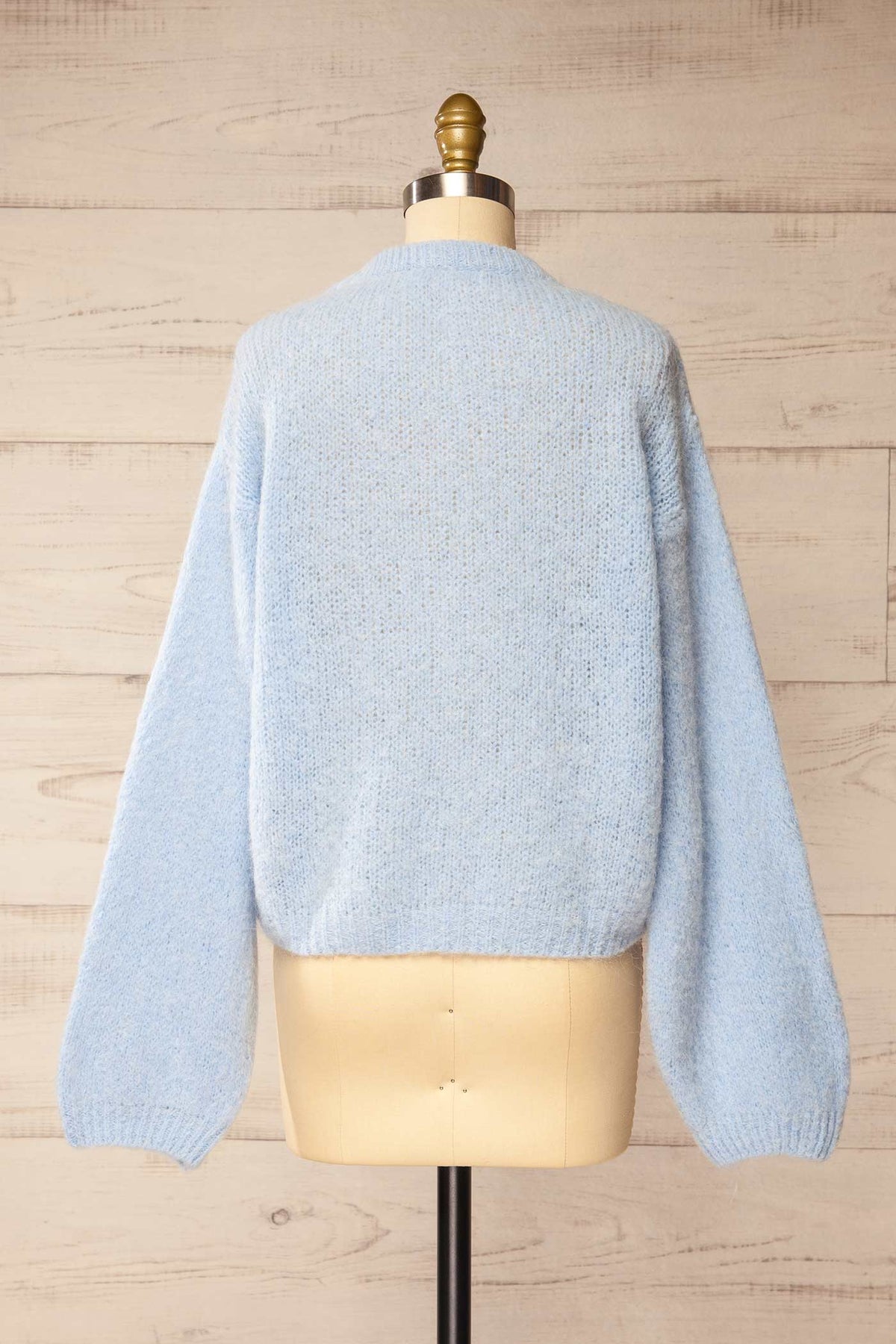 back view of Peruth Light Blue Button-Front Knit Cardigan at La petite garçonne
