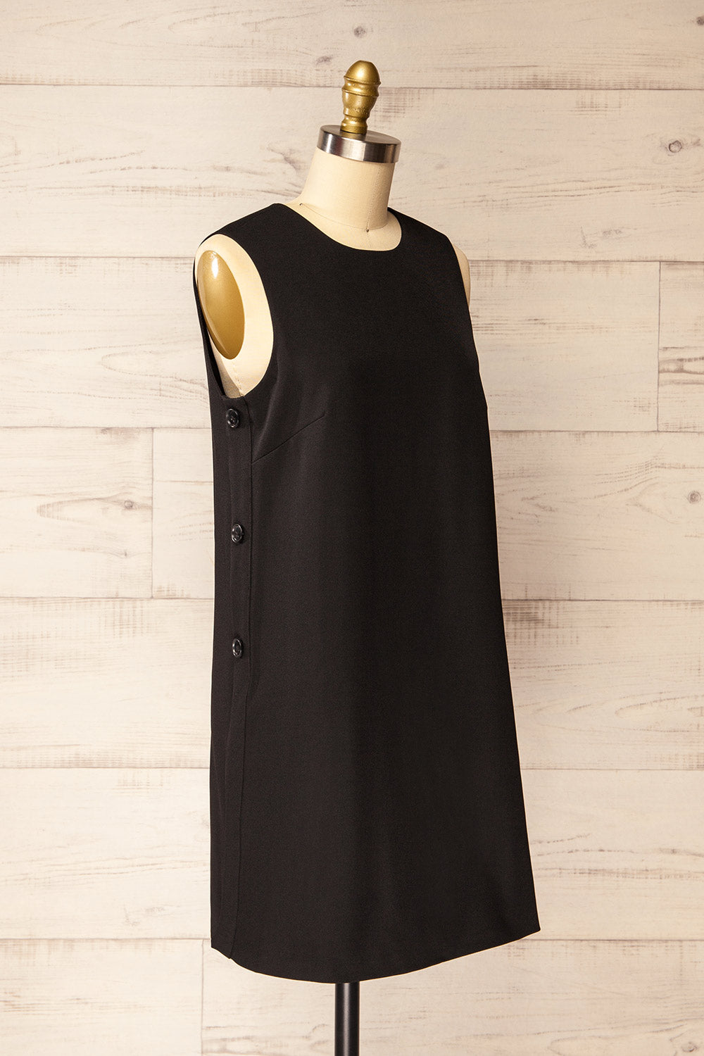 Phedi Black Sleeveless Dress with Button Detailing | La petite garçonne side view
