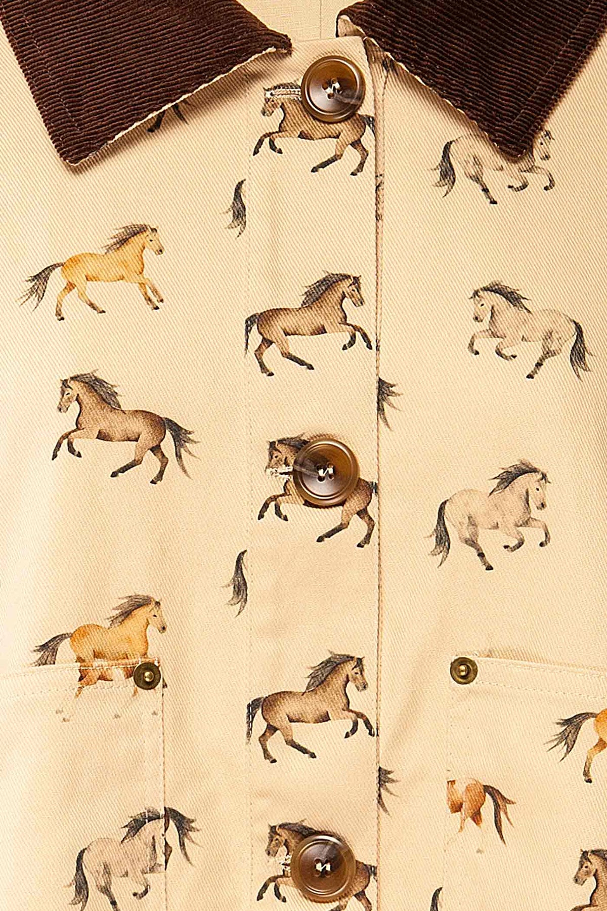 fabric view of Pietrosella Ivory Horse Print Canvas Jacket with Corduroy Collar at La petite garçonne