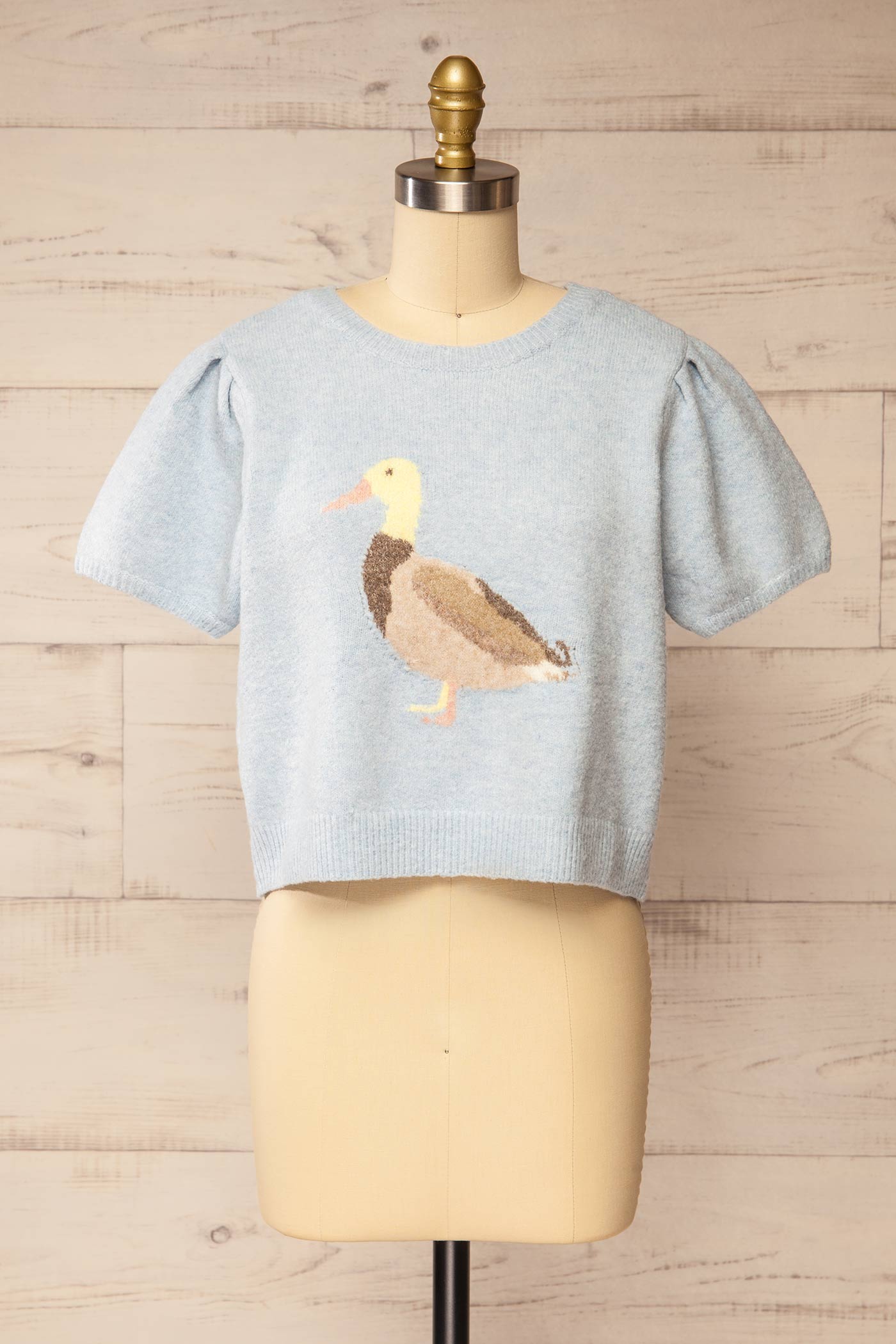 front view of Pokhodsk Blue Duck Graphic Short Puff Sleeve Knit Sweater at La petite garçonne