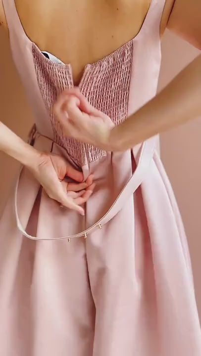 Person wearing Usagi Pink A-Line Dress with Square Neckline with Belt from Boutique 1861 