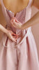 Person wearing Usagi Pink A-Line Dress with Square Neckline with Belt from Boutique 1861 