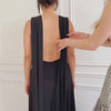 Tutorial video on model showing how to style our infinity dress with open halter back. 