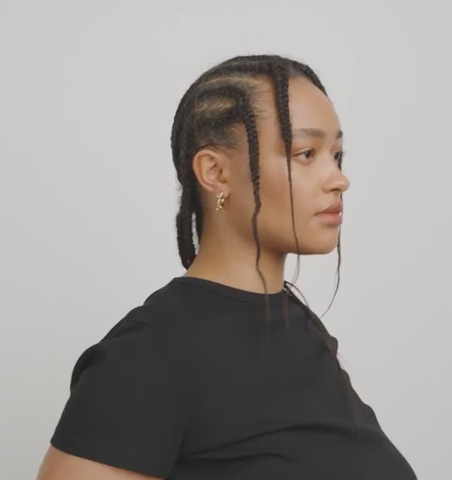 Video of a woman wearing Espoo from Pilgrim, a gold hoop earring with small stones available at La petite garçonne in Montreal.