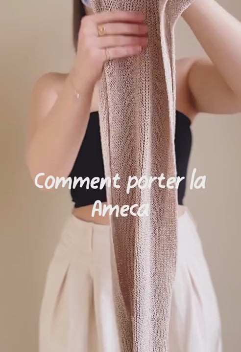 Tutorial Video of a woman wearing Ameca  Knitted Convertible Crop Top from La petite garçonne