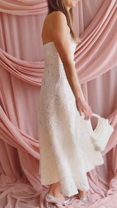 video of a woman wearing Samarah Midi Ivory Dress with Swirling Textured Pattern from Boudoir 1861 