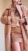 Video of a woman wearing Warwick Beige Button-Up Teddy Coat from La petite garçonne 