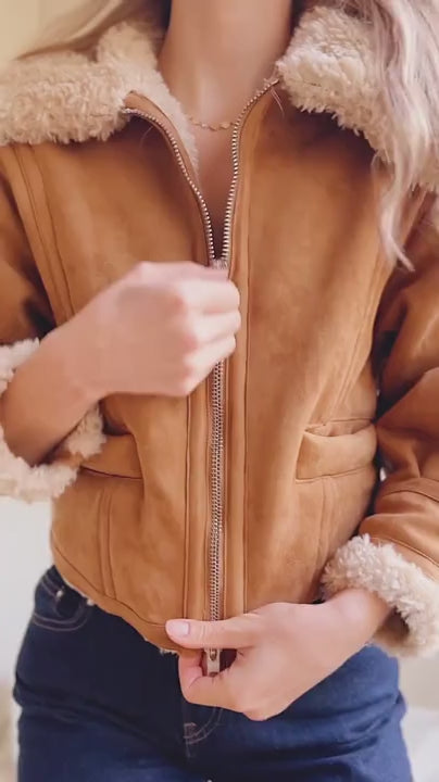 Video woman wearing Bathrust Faux Suede Caramel Jacket with Sherpa Lining from La petite garçonne