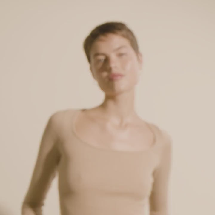 video of a woman wearing Ebna gold from Pilgrim, a gold hoop earring with stone details