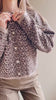 video Woman wearing Esenler Oversized Knitted Leopard Cardigan from La petite garçonne 