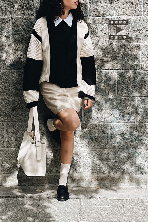 Video of a model wearing Elazig Two-Toned Long Sleeves Knit Top from La petite garçonne 