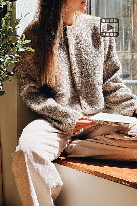 Video of a model wearing Bikaner Short Fuzzy Brown Cardigan from La petite garçonne 