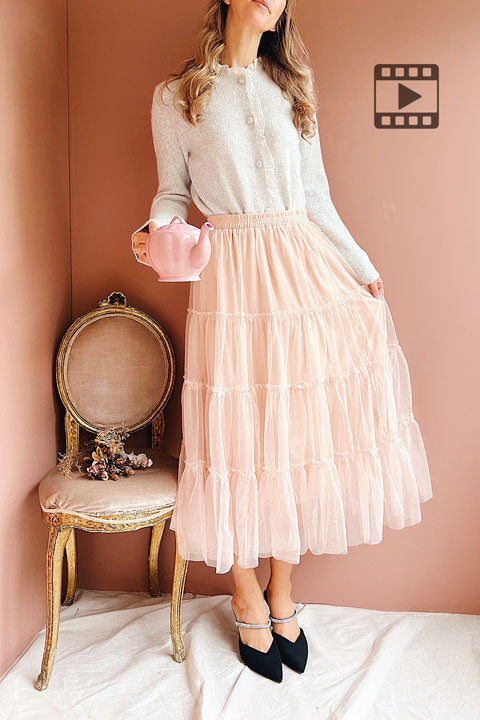 Video of a Model wearing the Yotsuba Blush Tiered Tulle Midi Skirt from Boutique 1861 