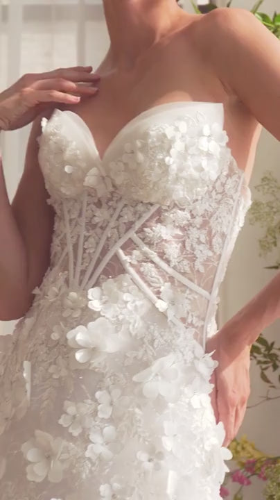 Video of a Woman wearing GWENYTH, a white floral dress with flowers and corset from Boudoir 1861