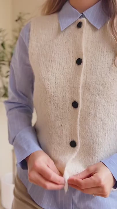 Video Woman wearing Cobar Ivory Fluffy Knitted Button-Up Vest from La petite garçonne 