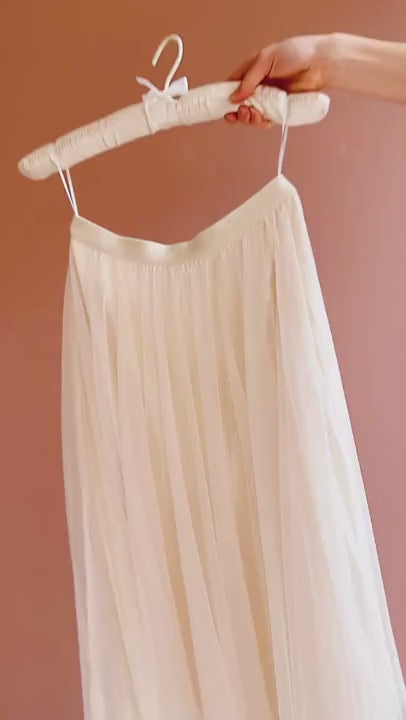 video of a model trying the Jamina white skirt