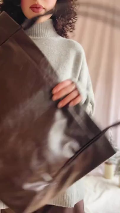 Video of a woman holding a Joffrey Large Brown Faux Leather Tote Bag from La petite garçonne