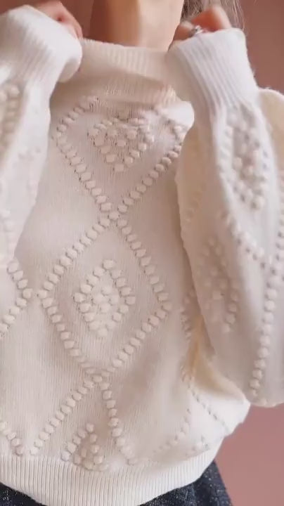 video Person wearing Kumari Textured Ivory Knit Sweater from Boutique 1861