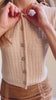 Woman wearing Cairns Beige Knitted Button-Down Top from La petite garçonne 