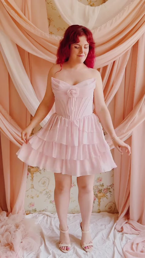 Video of the Naemia blue, pink and ivory Strapless Corset Mini Dress with Flower wear on 3 woman at boutique 1861