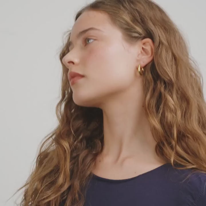 video of a woman wearing Gold hoop earrings Maitland from Pilgrim available at la petite garçonne