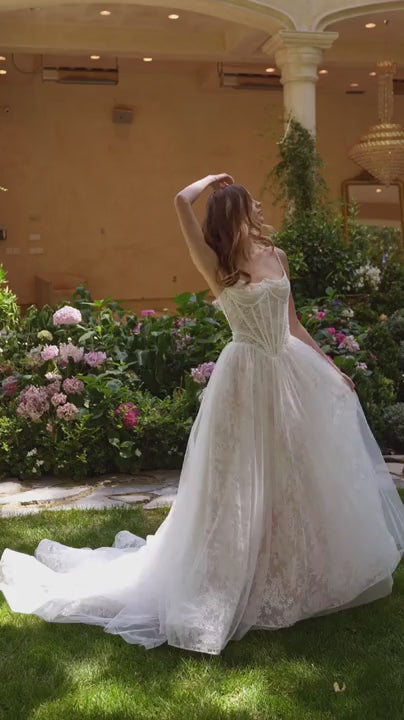 Video of a Woman wearing the Oliva White Corset Dress with Appliqués available at Boudoir 1861