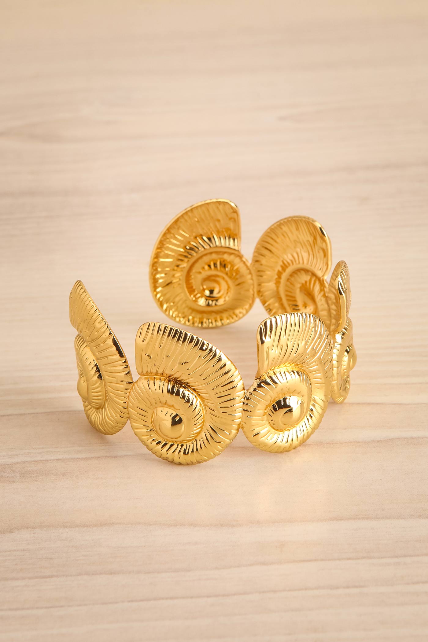 Purnia Gold Ammonite Seashell Cuff Bracelet at la petite garçonne