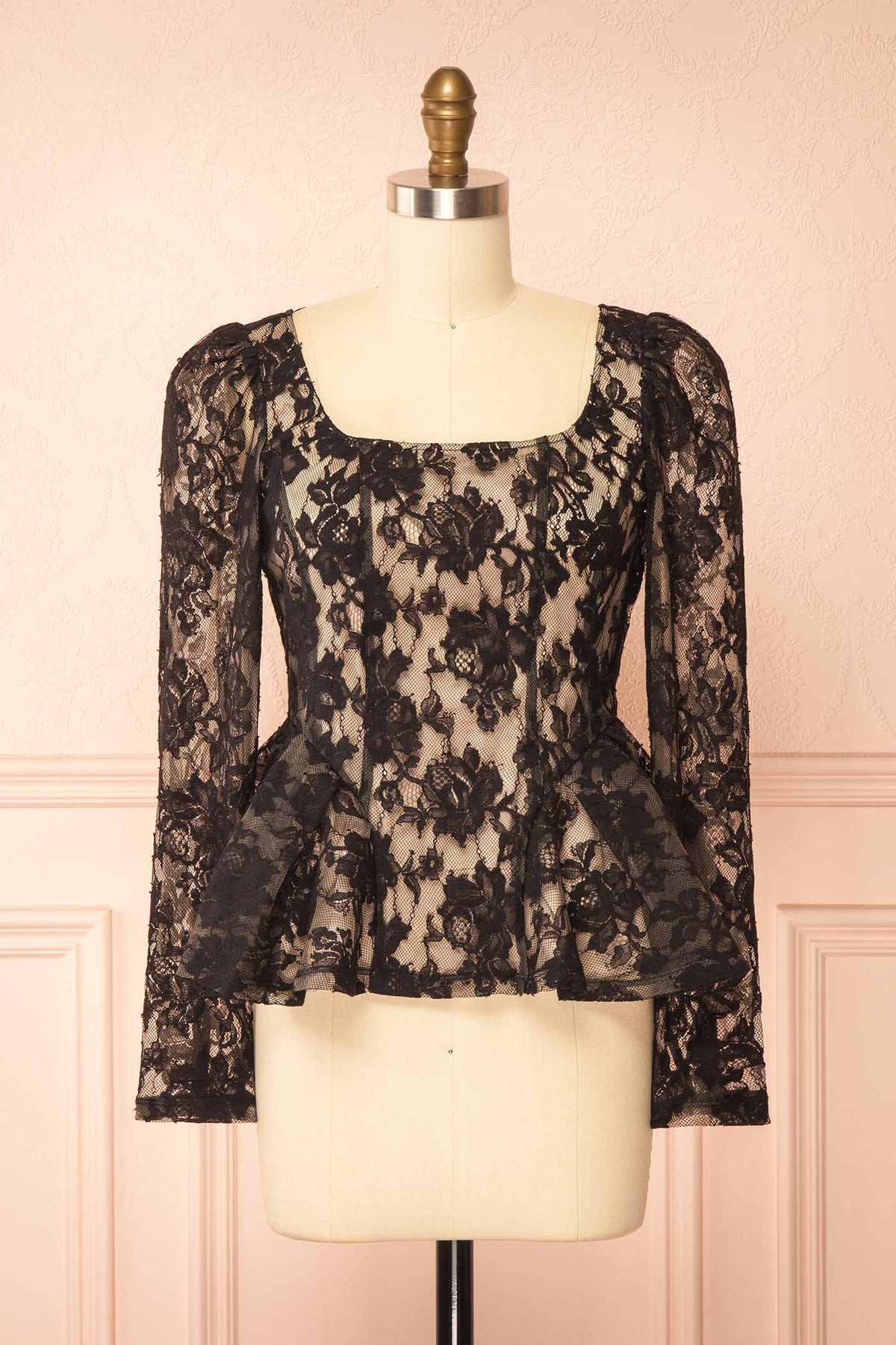 front view of Rabellia Black Floral Lace Peplum Top at Boutique 1861 