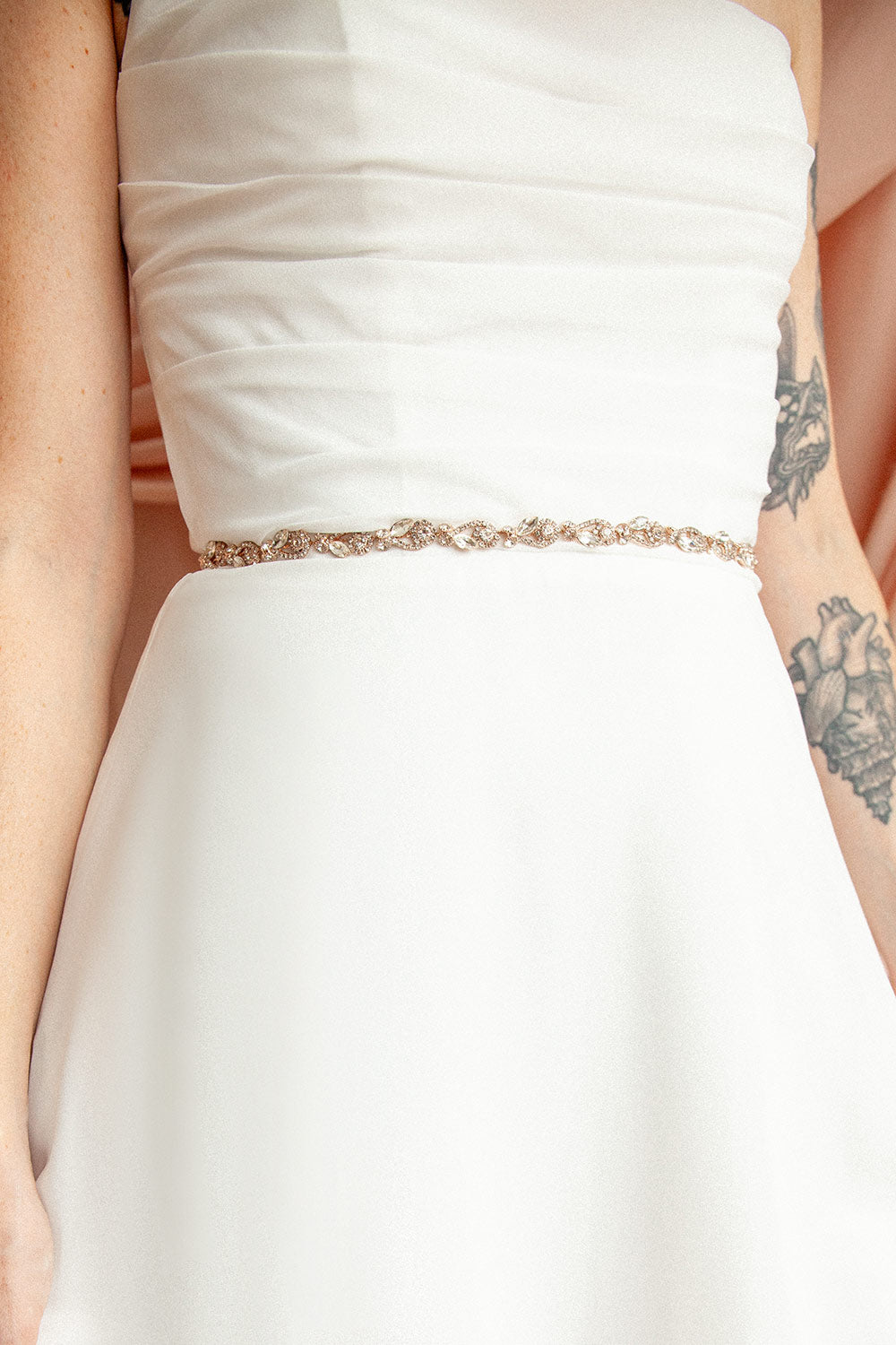  woman wearing Rajni Rosegold Crystal Ribbon Belt from Boudoir 1861