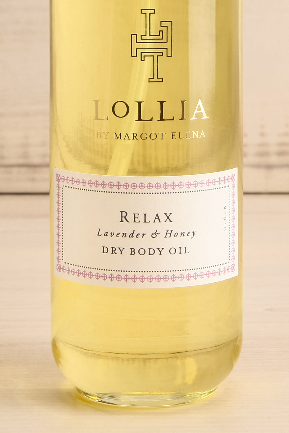 Relax Dry Body Oil | Maison garçonne bottle close-up