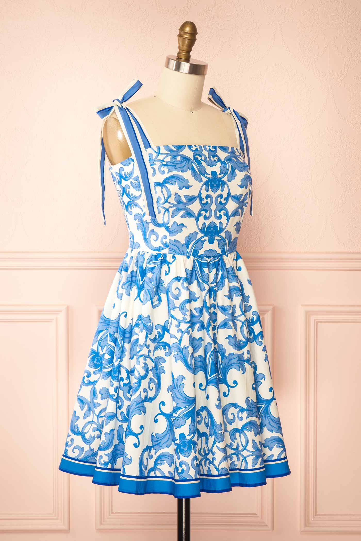 Profile view of Roberta Blue and White Tile Print Tie-Strap A-Line Short Dress at la boutique 1861