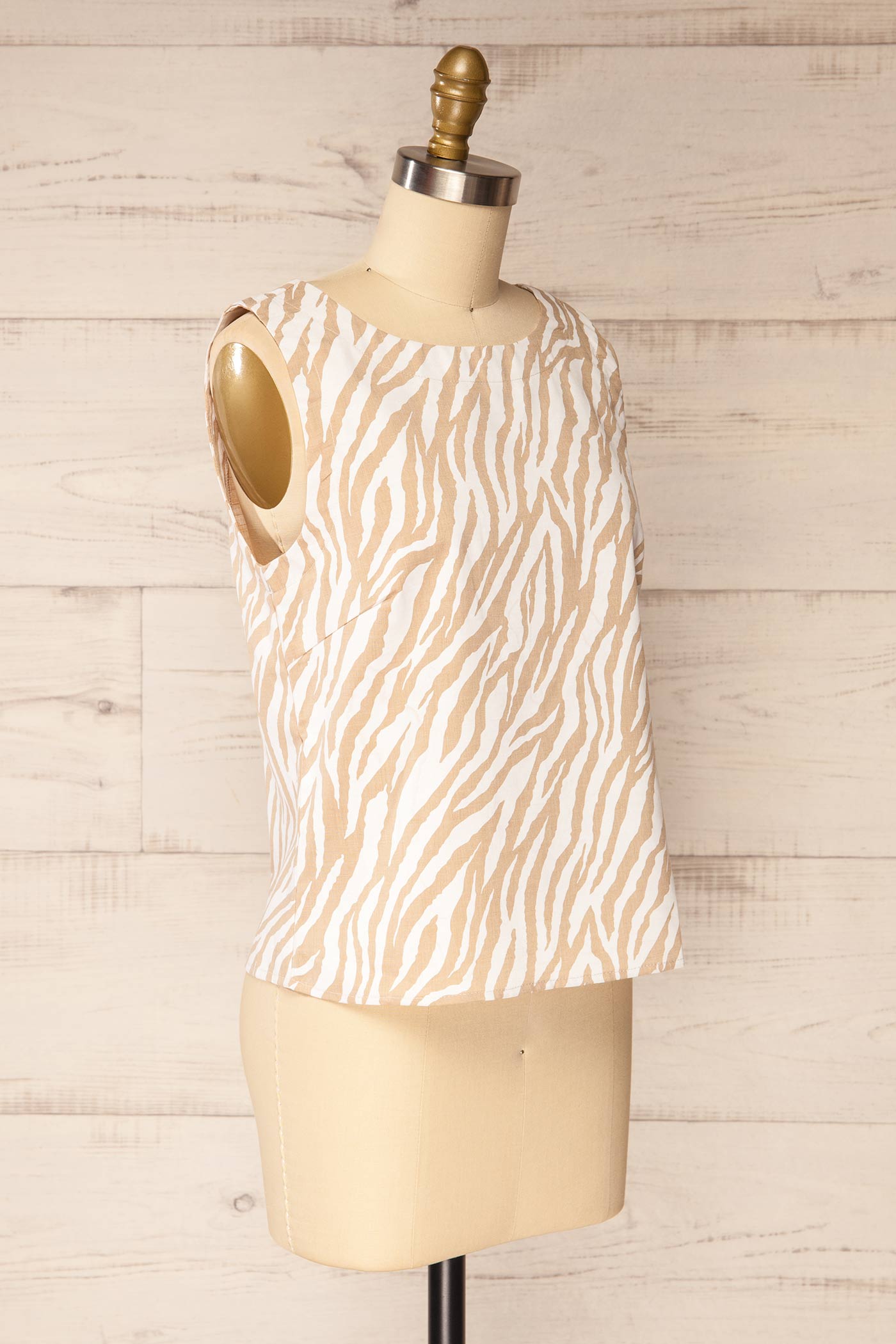 Sideview Roscoe Sleeveless White and Beige Zebra Print Top at la petite garçonne