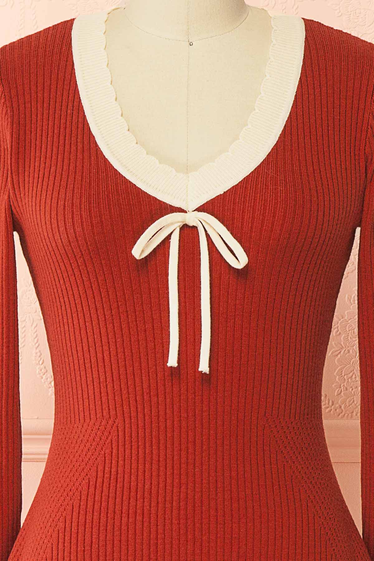 details view of Sabrinne Red Ribbed Knit Long Sleeve Mini Dress with Contrast Ruffle Trim at Boutique 1861