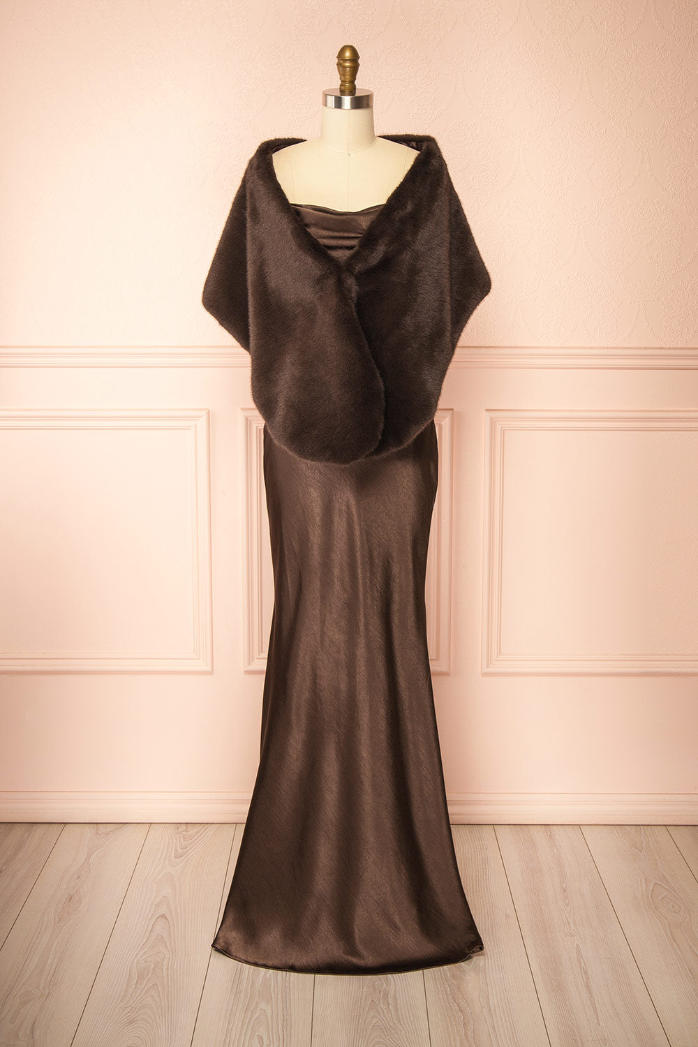 front view with shawl of a Mannequin wearing the Safiya brown Satin Maxi Dress with Faux Fur Shawl from boutique 1861