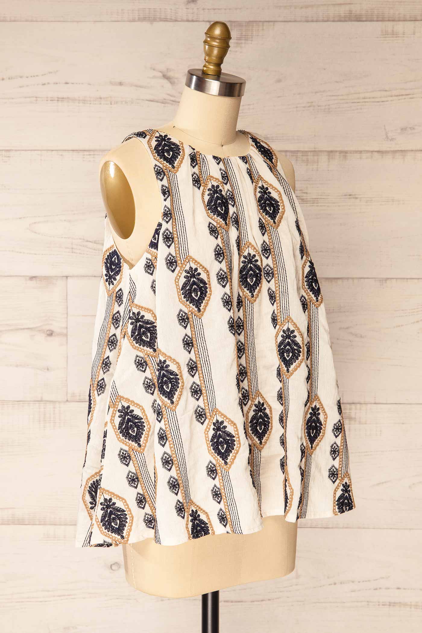 Sideview Sancole Ivory High-Neck Blouse Geometric Embroidery at la petite garçonne
