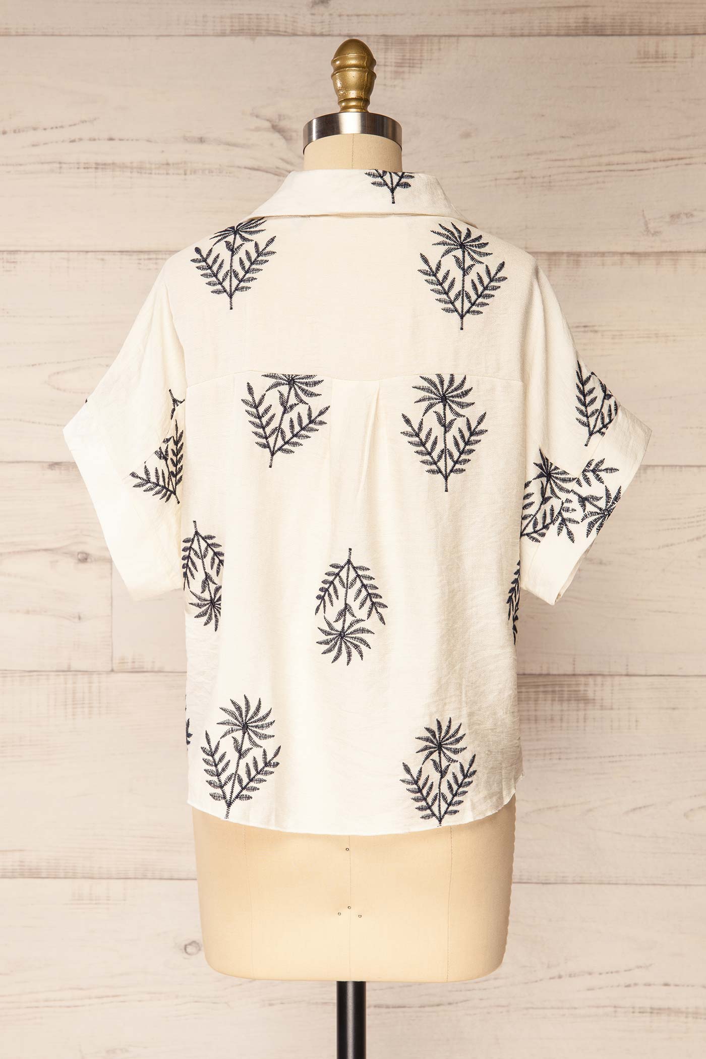 Backview Sangrur Ivory Shirt with Knotted Hem and Botanical Print at la petite garçonne