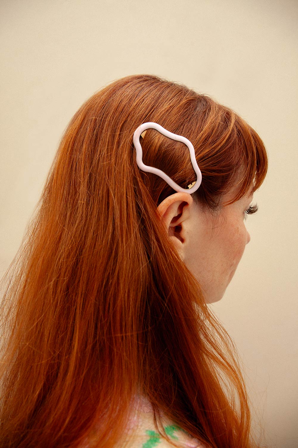 woman wearing Satelitte Pink Abstract Shaped Hair Clip from La petite garçonne