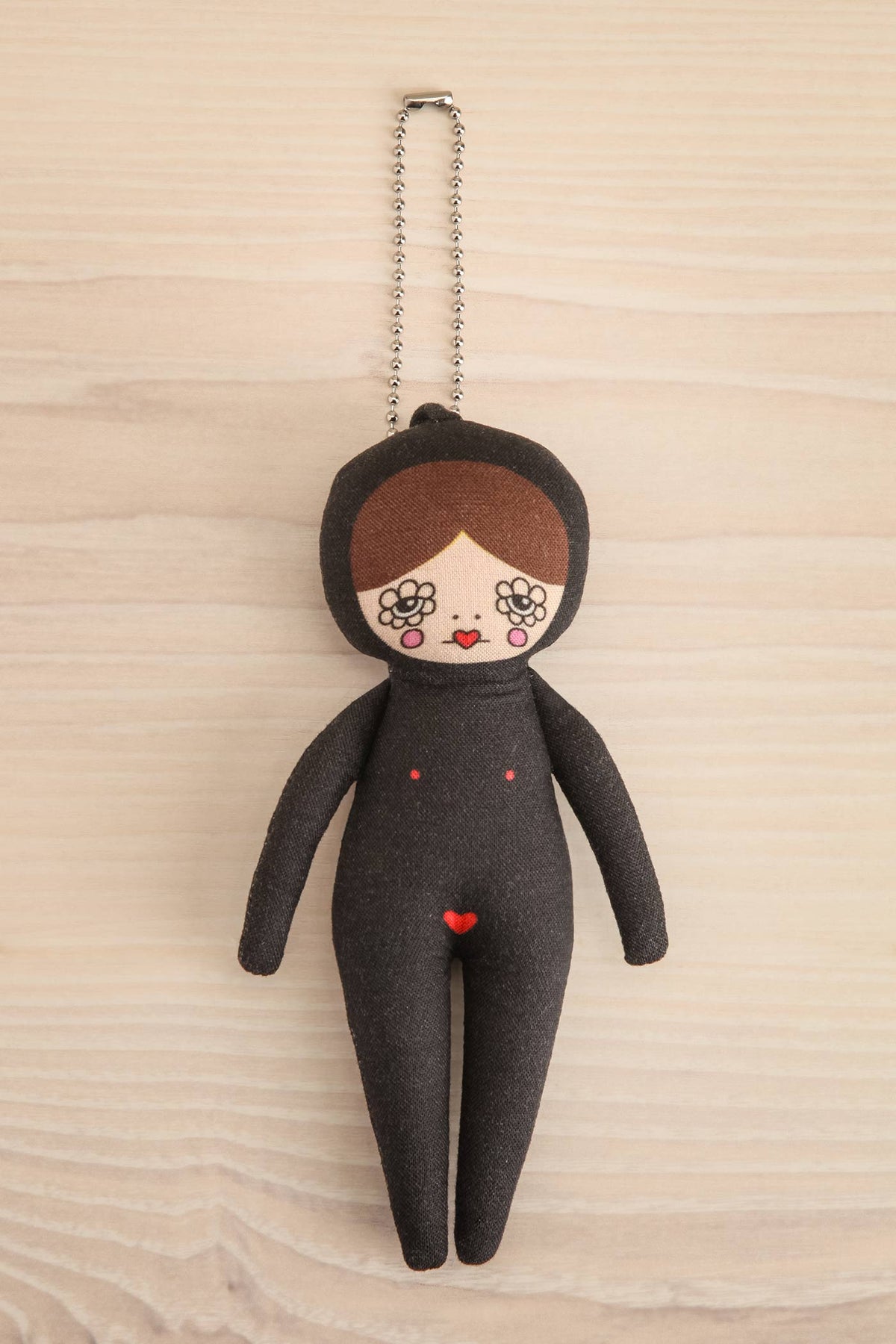 view of light Selma Black Jumpsuit Doll Bag Charm - 3 options at Maison garçonne