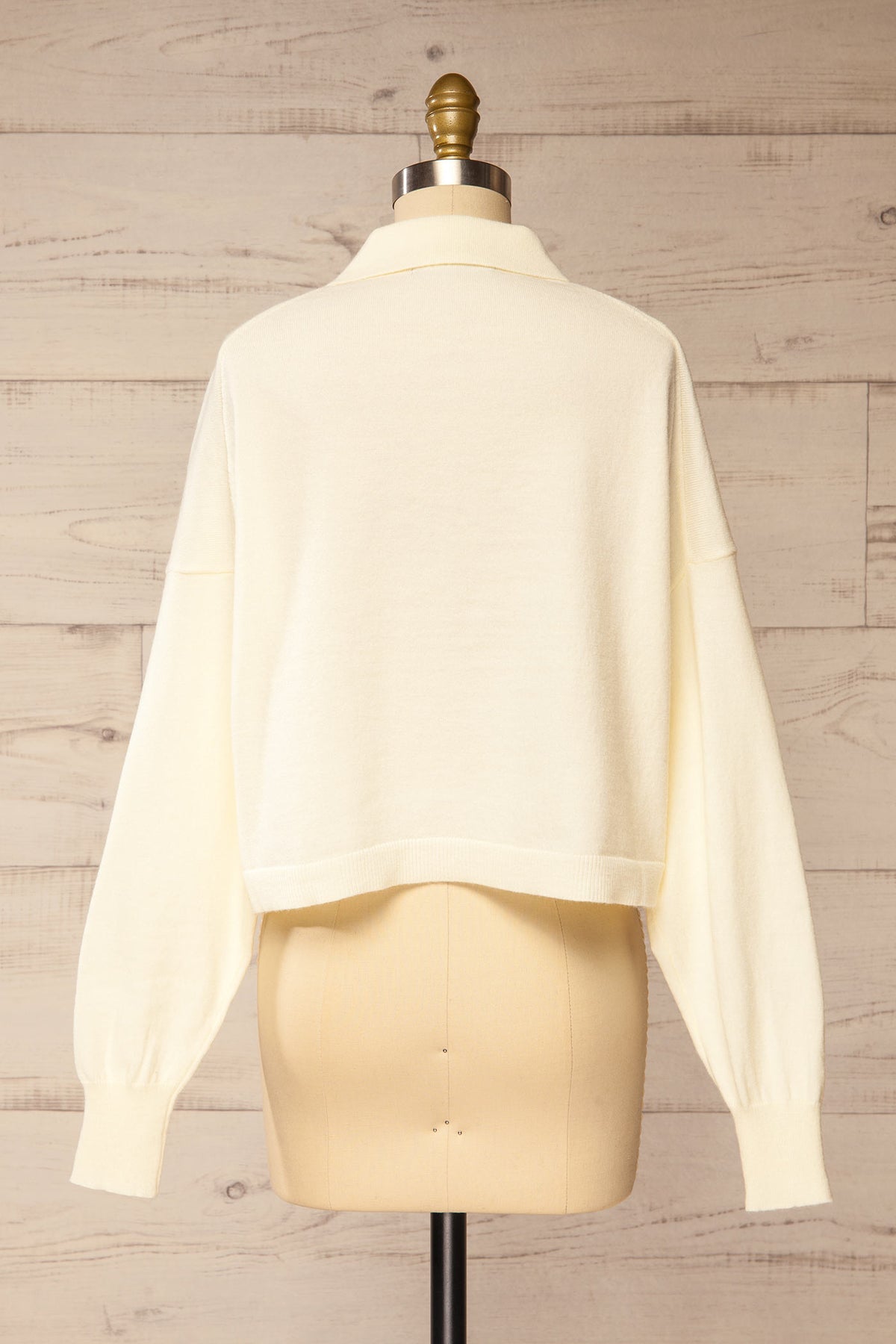 back view of Shigawake Ivory Cropped Polo Sweater at La petite garçonne