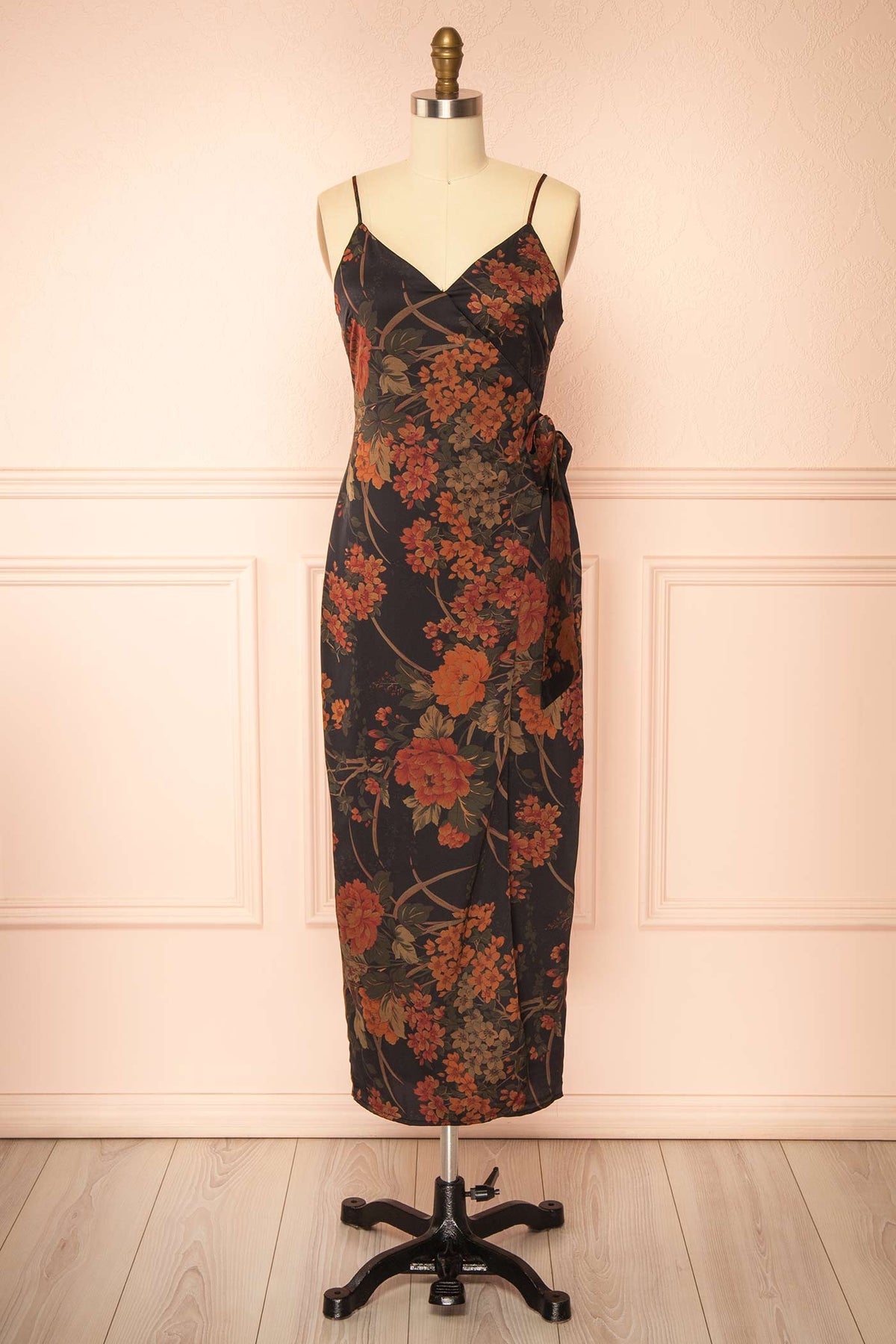 front view of Sildorine Black Floral Wrap Midi Dress with Adjustable Straps at La petite garçonne