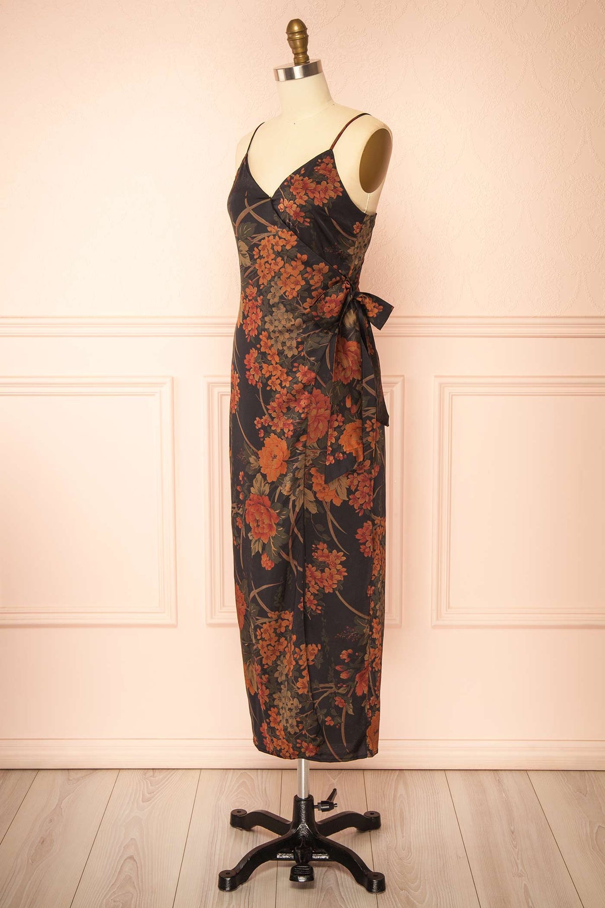 side view of Sildorine Black Floral Wrap Midi Dress with Adjustable Straps at La petite garçonne