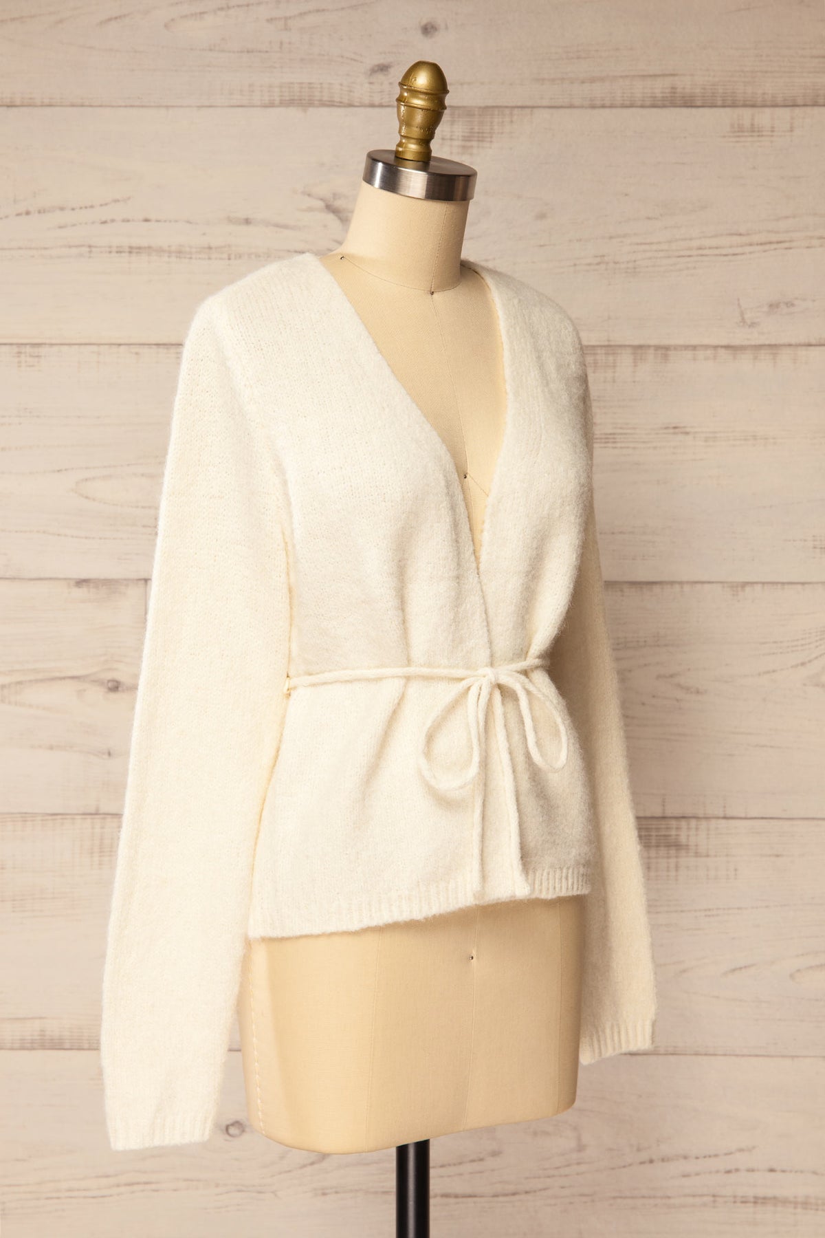 side view of Sovo Ivory Soft Knit Tie-Waist Wrap Cardigan at La petite garçonne