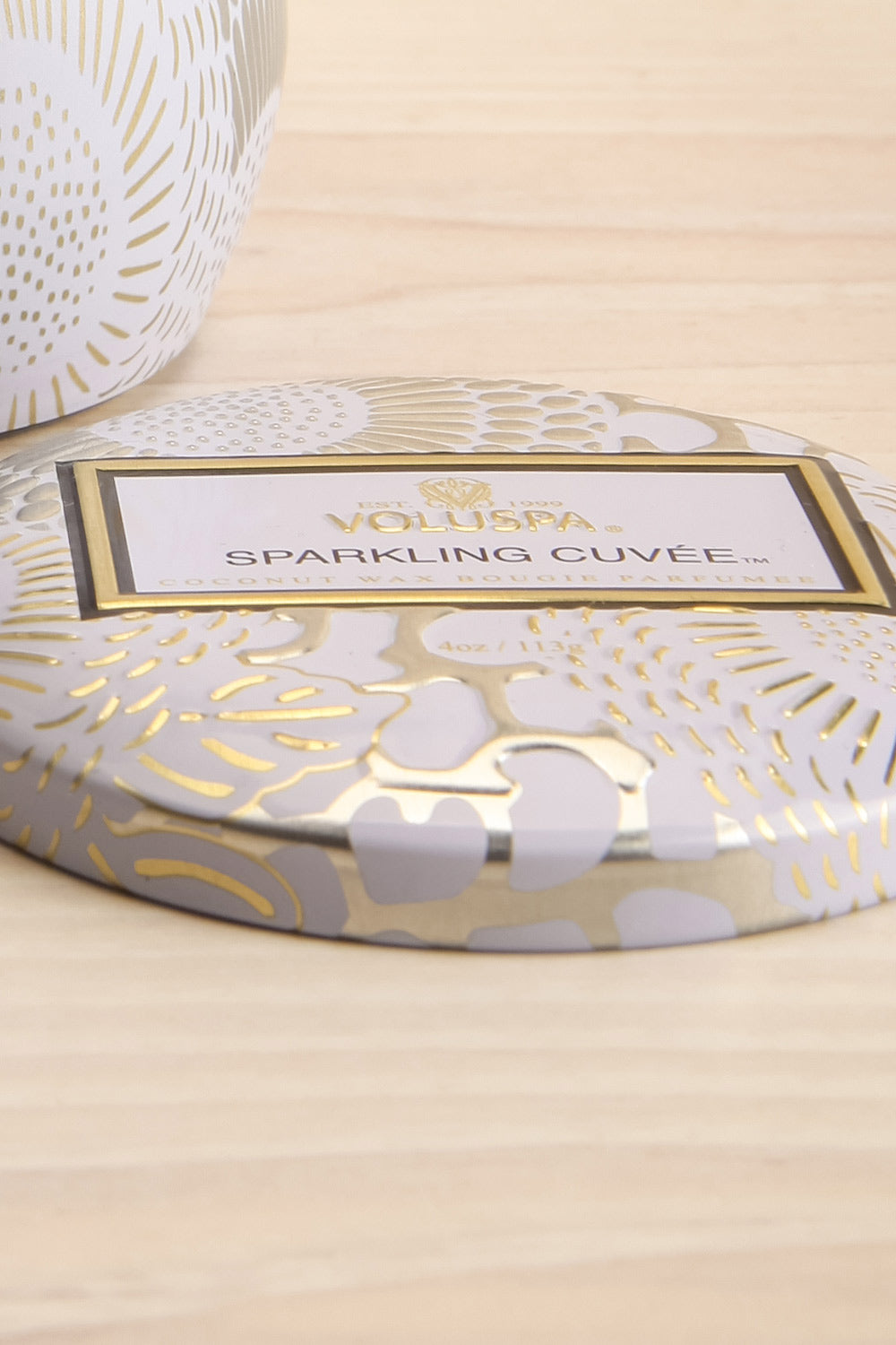 Sparkling Cuvée Mini Tin Candle by Voluspa | Maison garçonne lid close-up