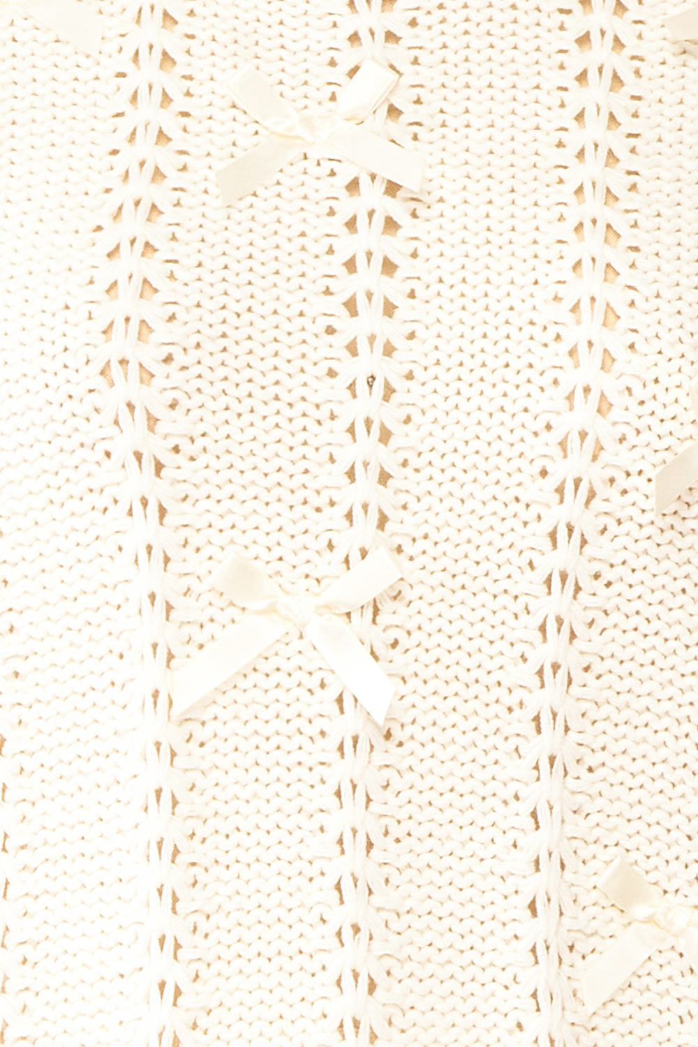 Sully Cream Knit Shirt w/ Bows | Boutique 1861 fabric