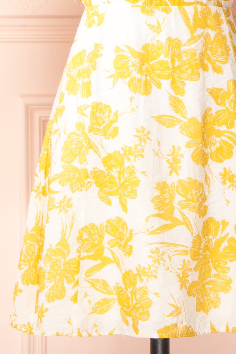 Swan Short Yellow Floral Dress w/ Open Back | Boutique 1861 bottom close-up